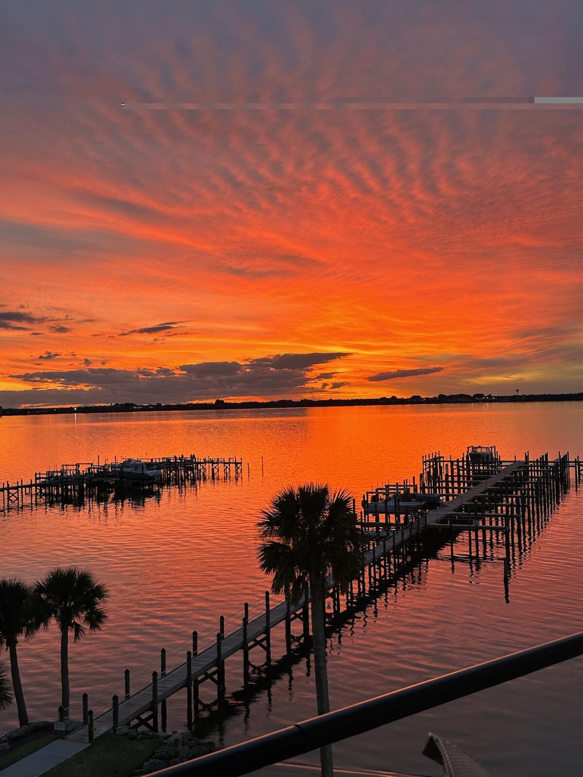 225 Strand Drive, Unit 406 Melbourne Beach, FL 32951 - Photo 45 of 49 a view of a lake from a yard