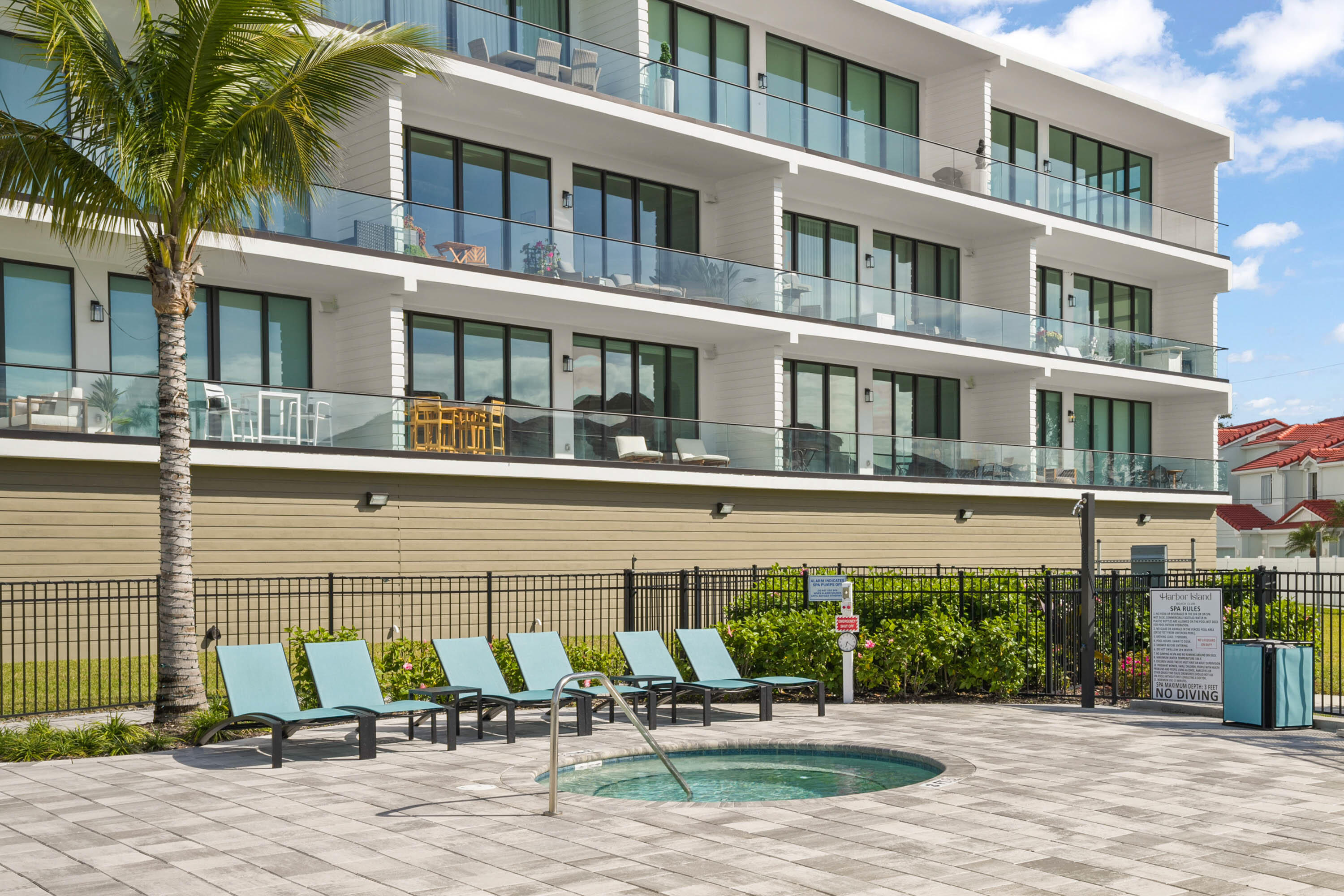 225 Strand Drive, Unit 406 Melbourne Beach, FL 32951 - Photo 7 of 49 a view of a building with a patio