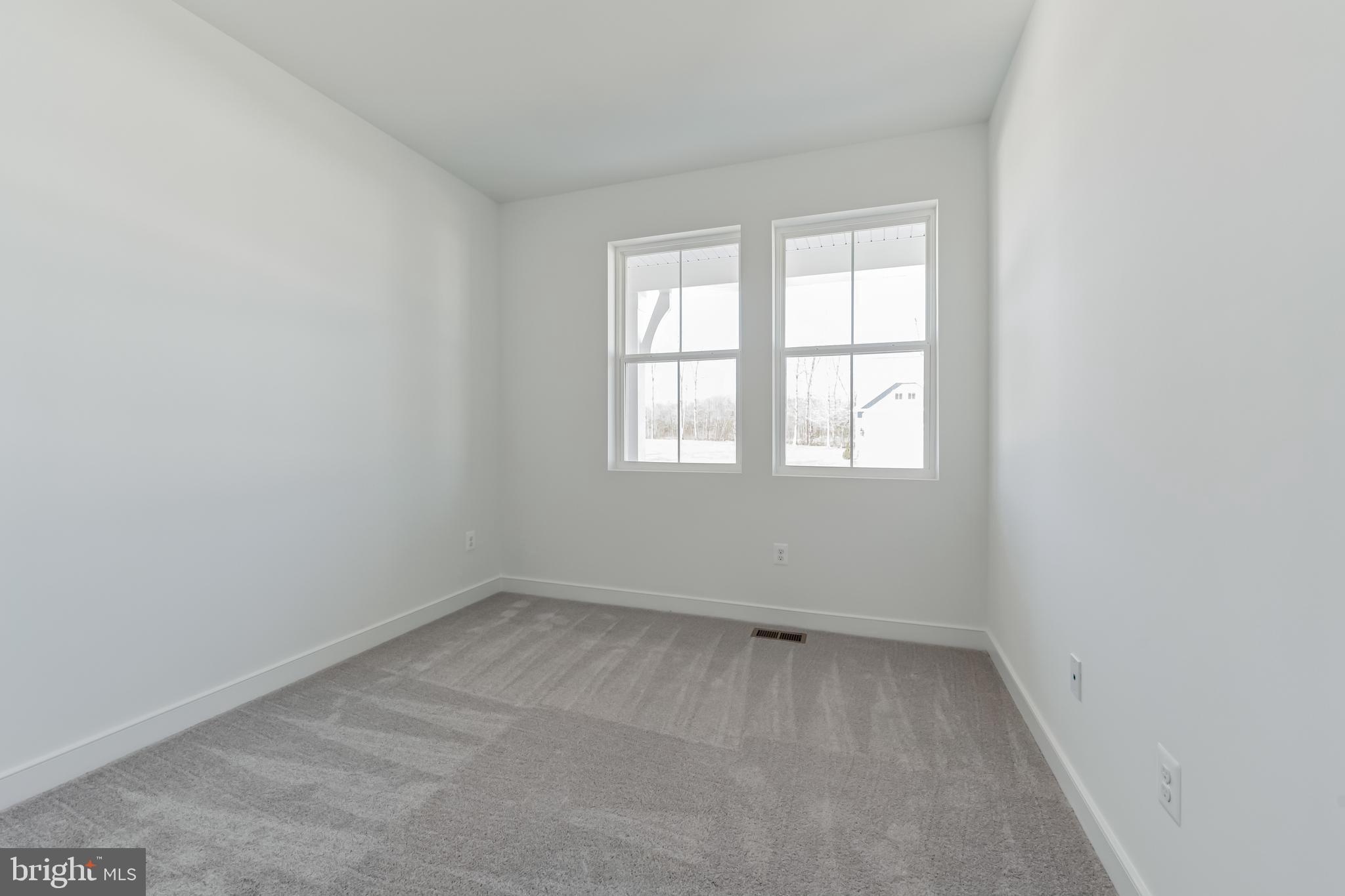 36419 Maple Ridge Lane Georgetown, DE 19947 - Photo 14 of 24 an empty room with a window