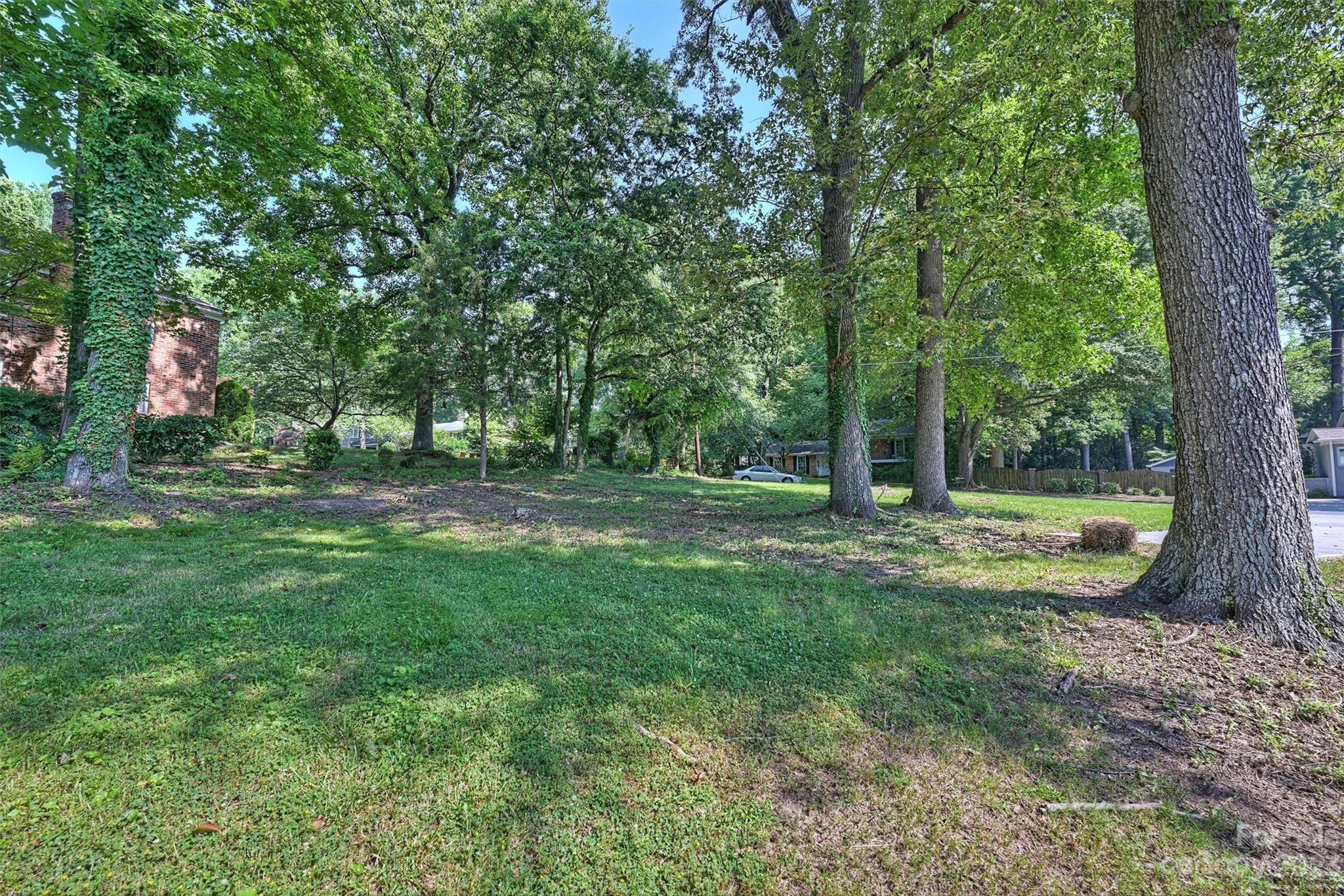 3900 Rhodes Avenue Charlotte, NC 28210 - Photo 22 of 23 a view of a park that has large trees