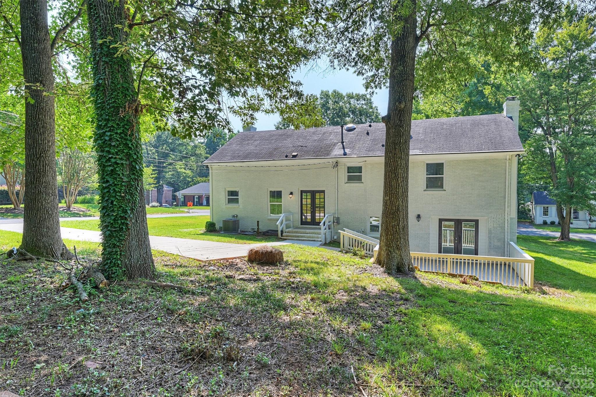 3900 Rhodes Avenue Charlotte, NC 28210 - Photo 23 of 23 a view of a house with backyard and garden