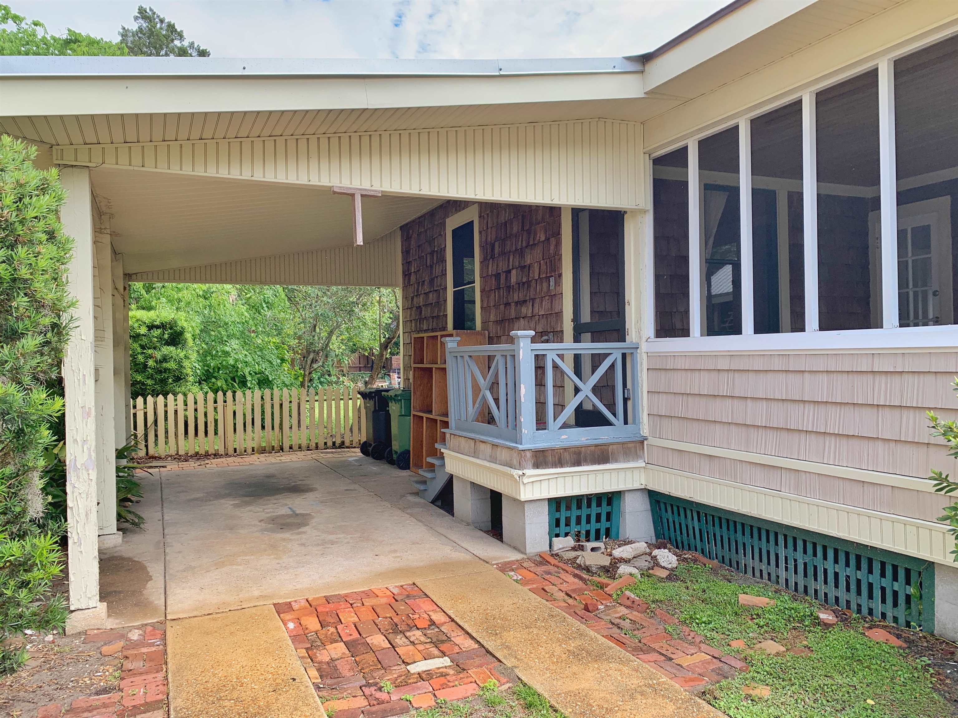 142 Oviedo Street St. Augustine, FL 32084 - Photo 14 of 15 a view of a deck with wooden floor and fence