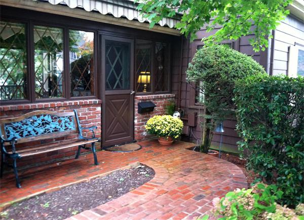 78 Richfield Road Arlington, MA 02474 - Photo 4 of 30 a view of a bench in back yard of a house