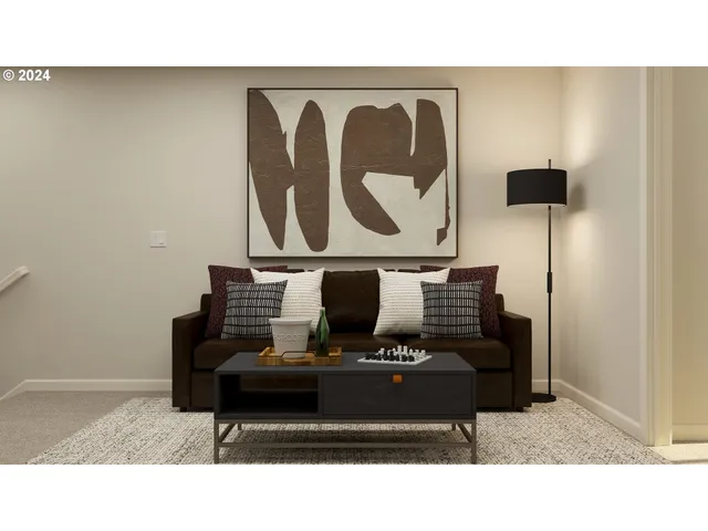 a black and white photo of a living room