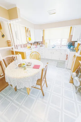 a dining room with furniture and a table