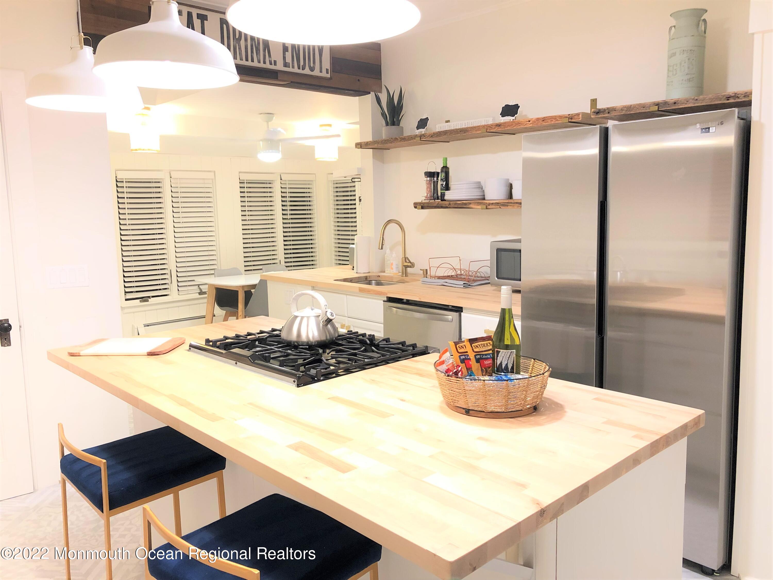 487 West Street Long Branch, NJ 07740 - Photo 11 of 48 a kitchen with a sink appliances and cabinets