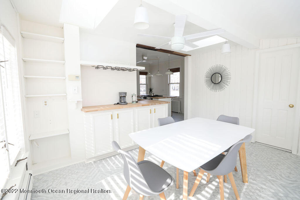 487 West Street Long Branch, NJ 07740 - Photo 15 of 48 a kitchen with granite countertop a sink cabinets and stainless steel appliances