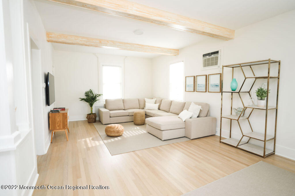 487 West Street Long Branch, NJ 07740 - Photo 2 of 48 a living room with furniture and white walls