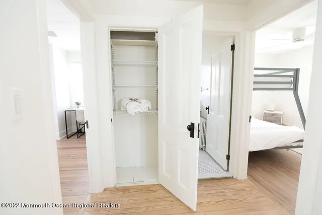 a view of a bathroom from the hallway