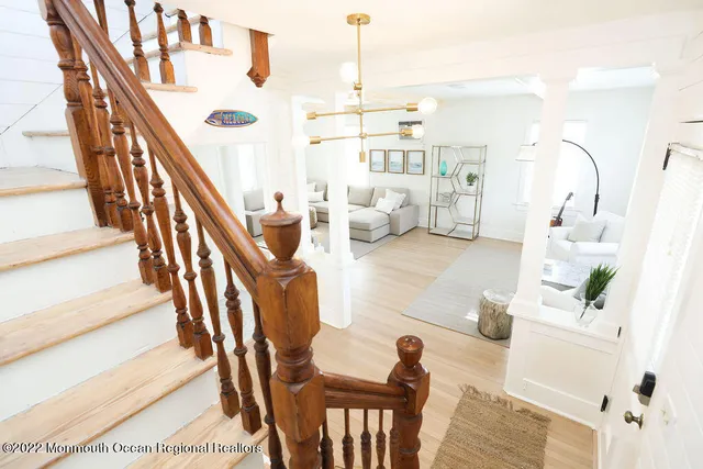 a view of entryway with wooden floor