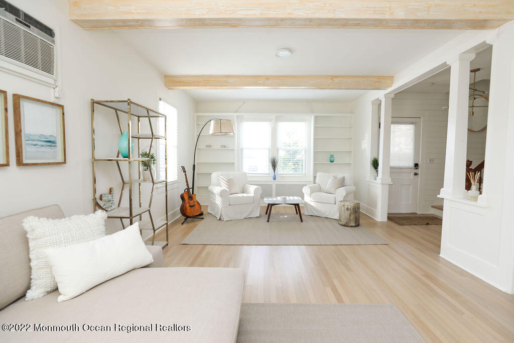 487 West Street Long Branch, NJ 07740 - Photo 4 of 48 a living room with furniture and a table