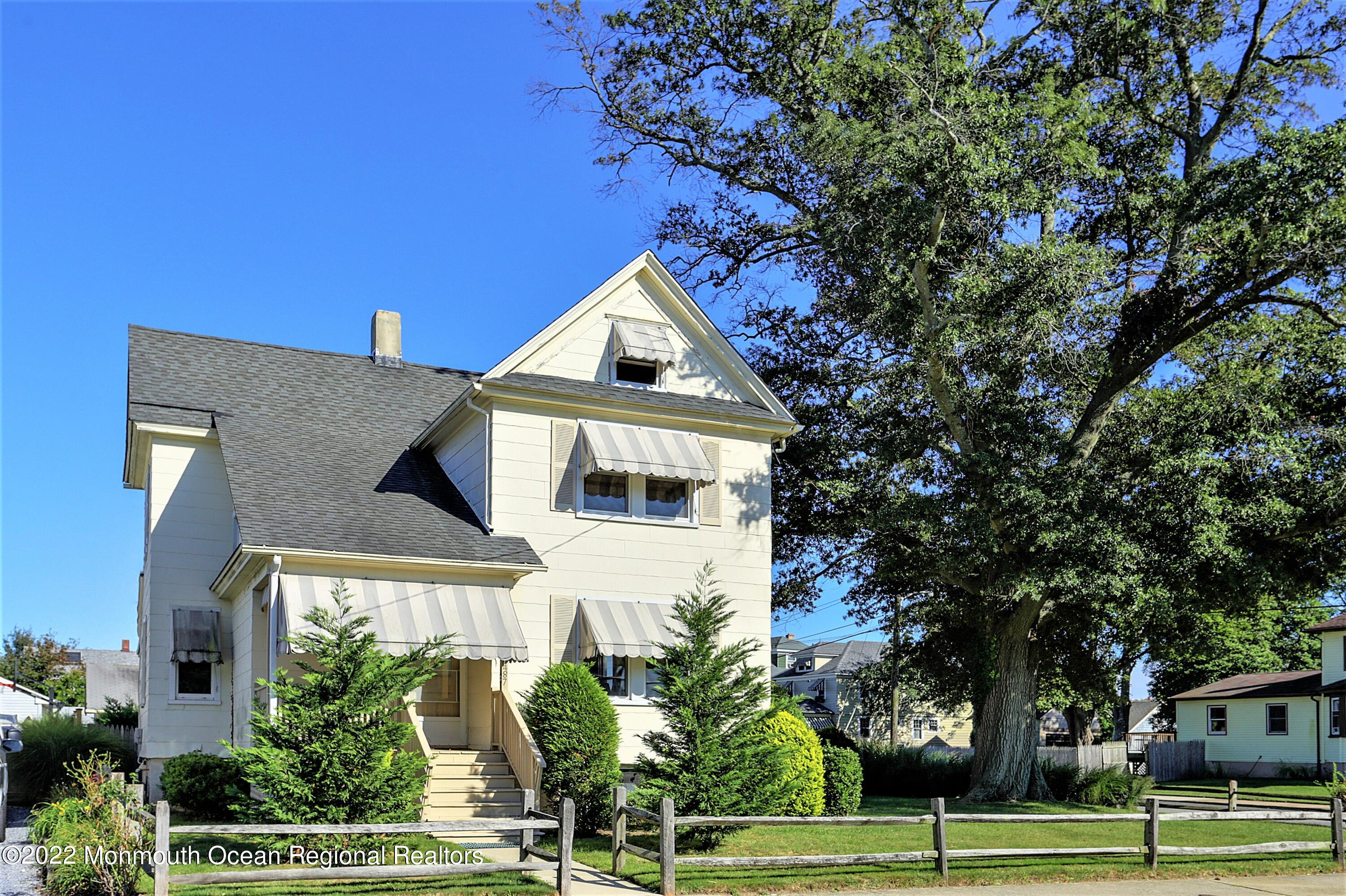 487 West Street Long Branch, NJ 07740 - Photo 43 of 48 a front view of a house with a yard