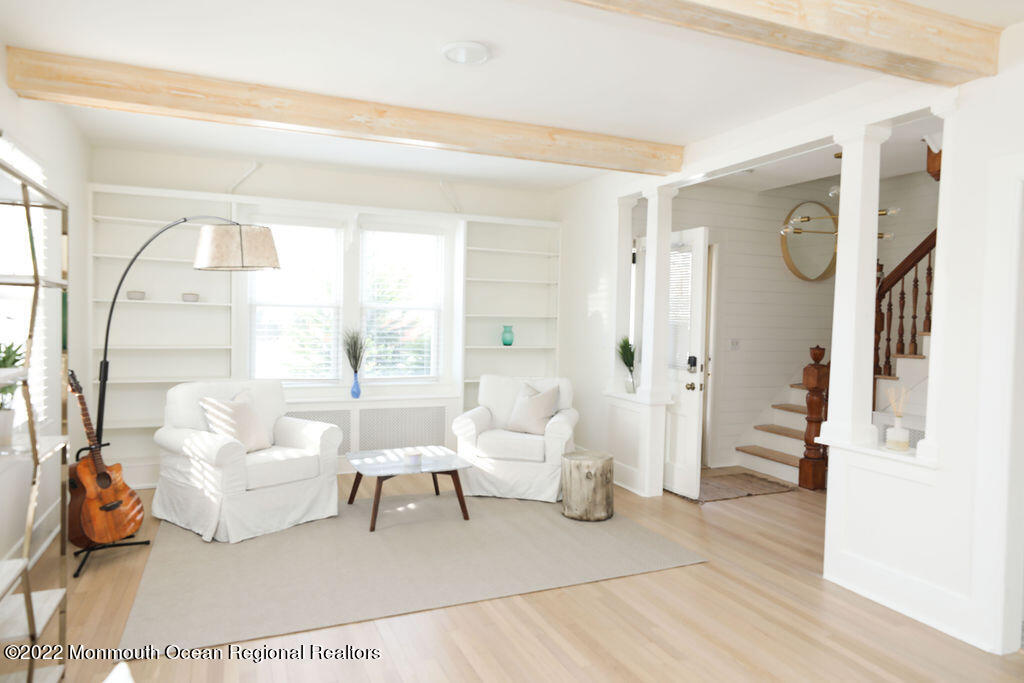 487 West Street Long Branch, NJ 07740 - Photo 5 of 48 a living room with furniture and a large window