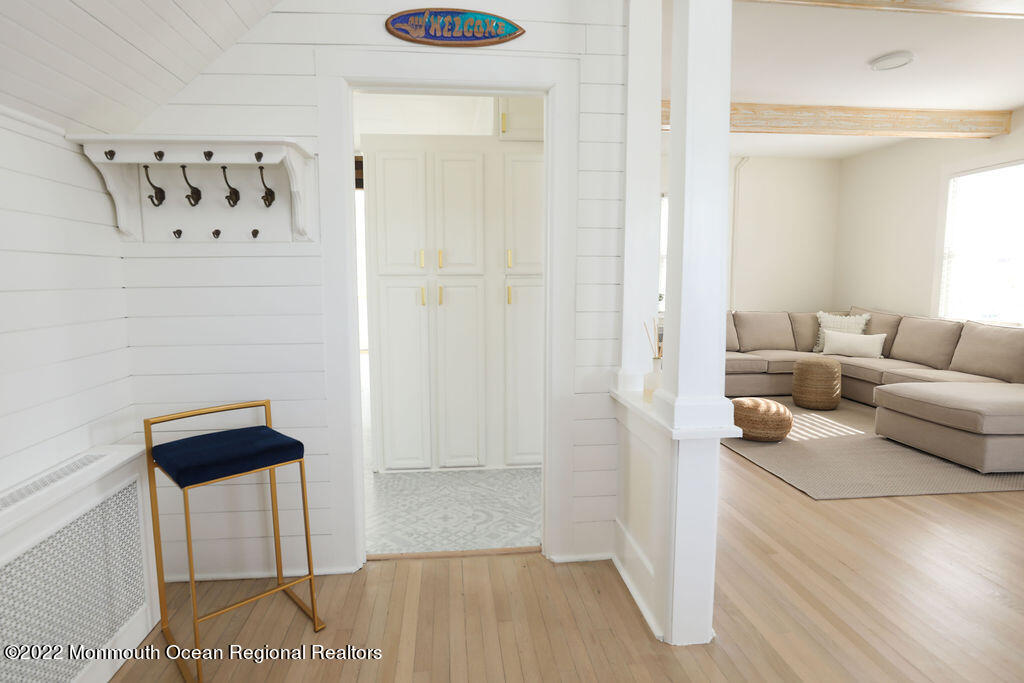 487 West Street Long Branch, NJ 07740 - Photo 9 of 48 a living room with furniture and a rug