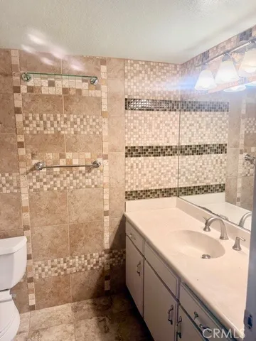 a bathroom with a sink and a shower
