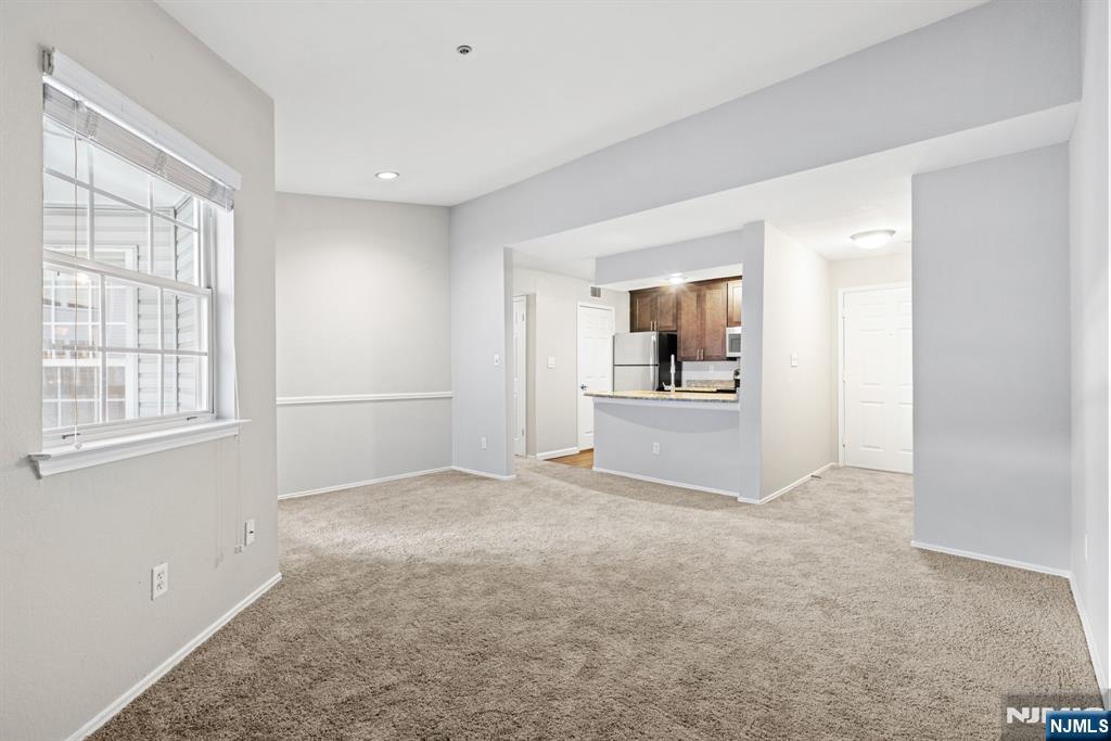 690 Rt 23, Unit R1 Wayne, NJ 07470 - Photo 5 of 11 a view of an empty room with a window