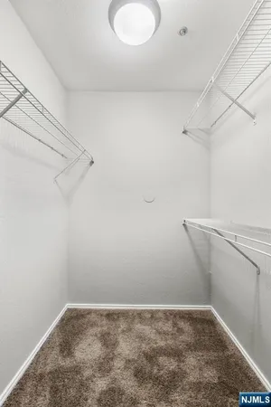 a view of a room with racks on the wall