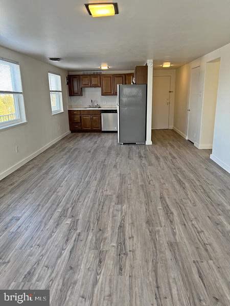 2135 Suburban Road, Unit 5 York, PA 17403 - Photo 4 of 7 a view of a room with wooden floor and window