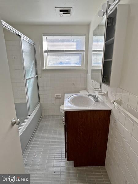 2135 Suburban Road, Unit 5 York, PA 17403 - Photo 7 of 7 a bathroom with a sink and a mirror