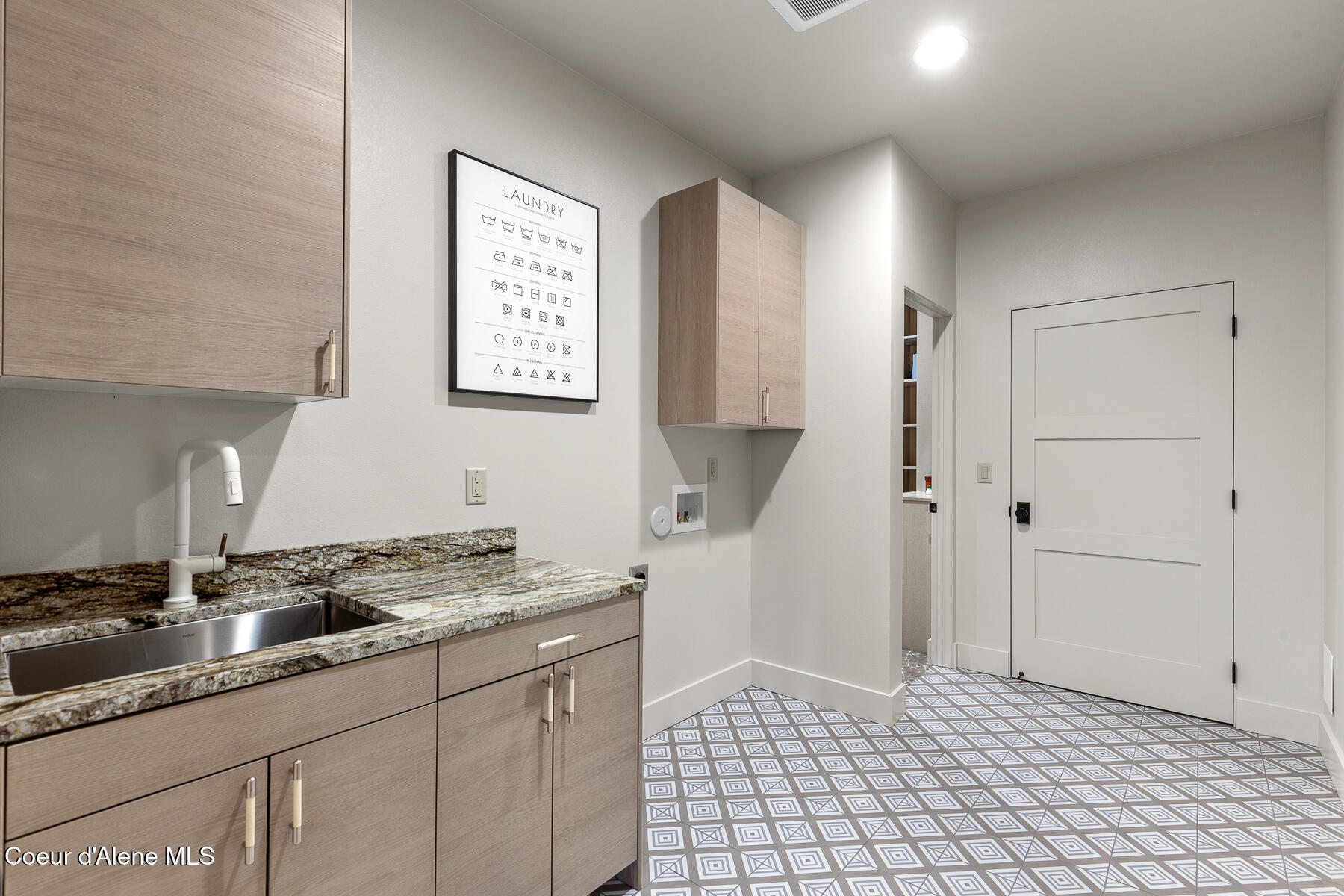 945 North 5th Street Coeur D'Alene, ID 83814 - Photo 17 of 39 spacious laundry room with sink