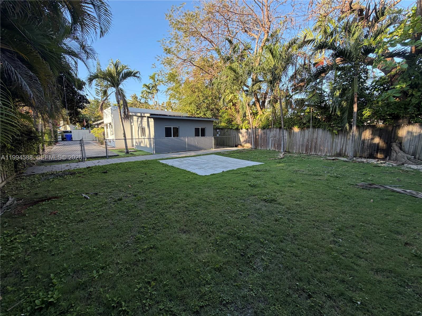 3373 Southwest 29th Terrace Miami, FL 33133 - Photo 6 of 26 a backyard of a house