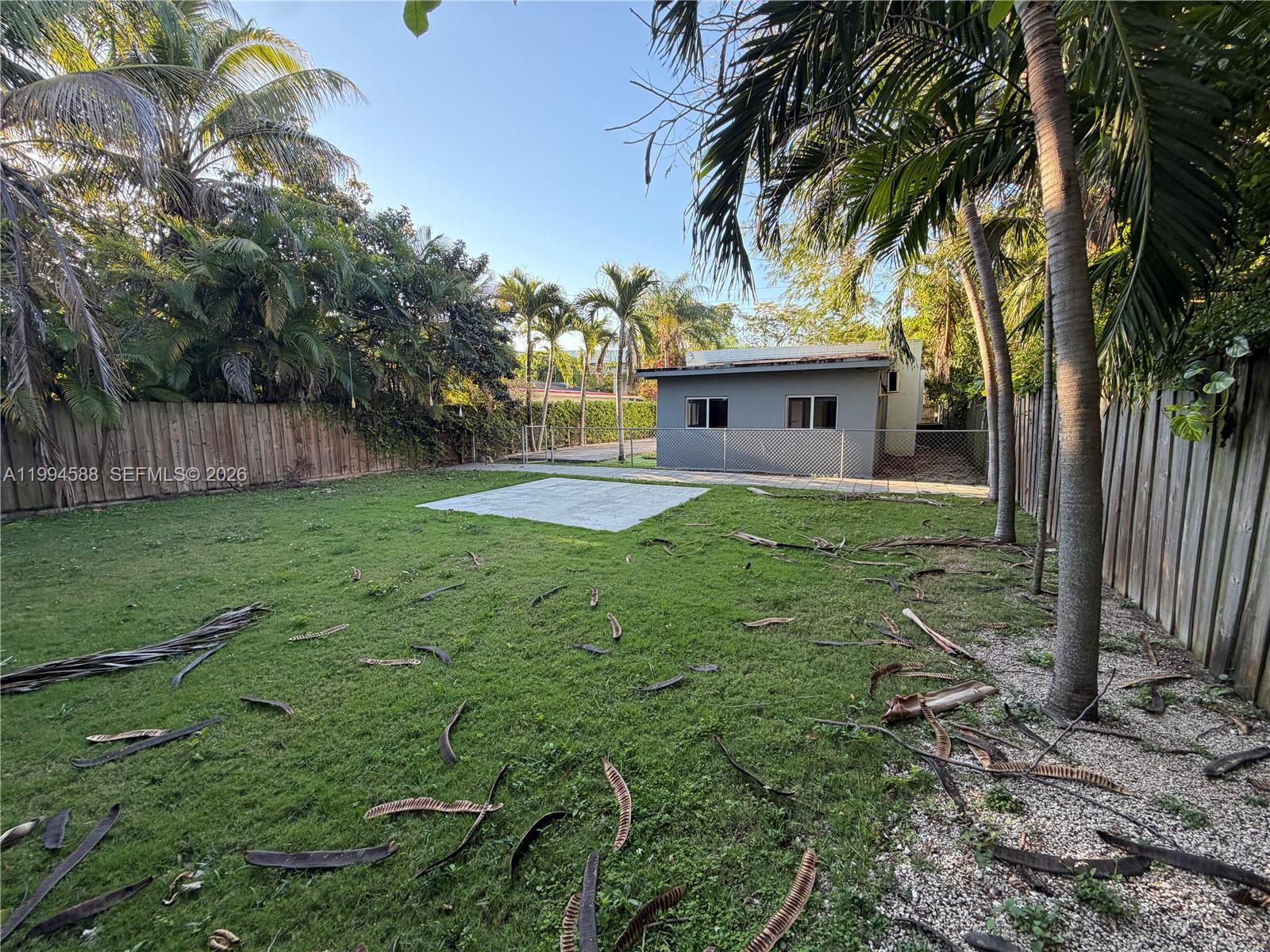 3373 Southwest 29th Terrace Miami, FL 33133 - Photo 7 of 26 a view of a house with a yard
