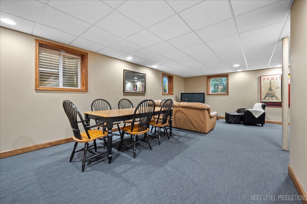 2620 Sweetbroom Road Naperville, IL 60564 - Photo 23 of 30 a living room with furniture and a window