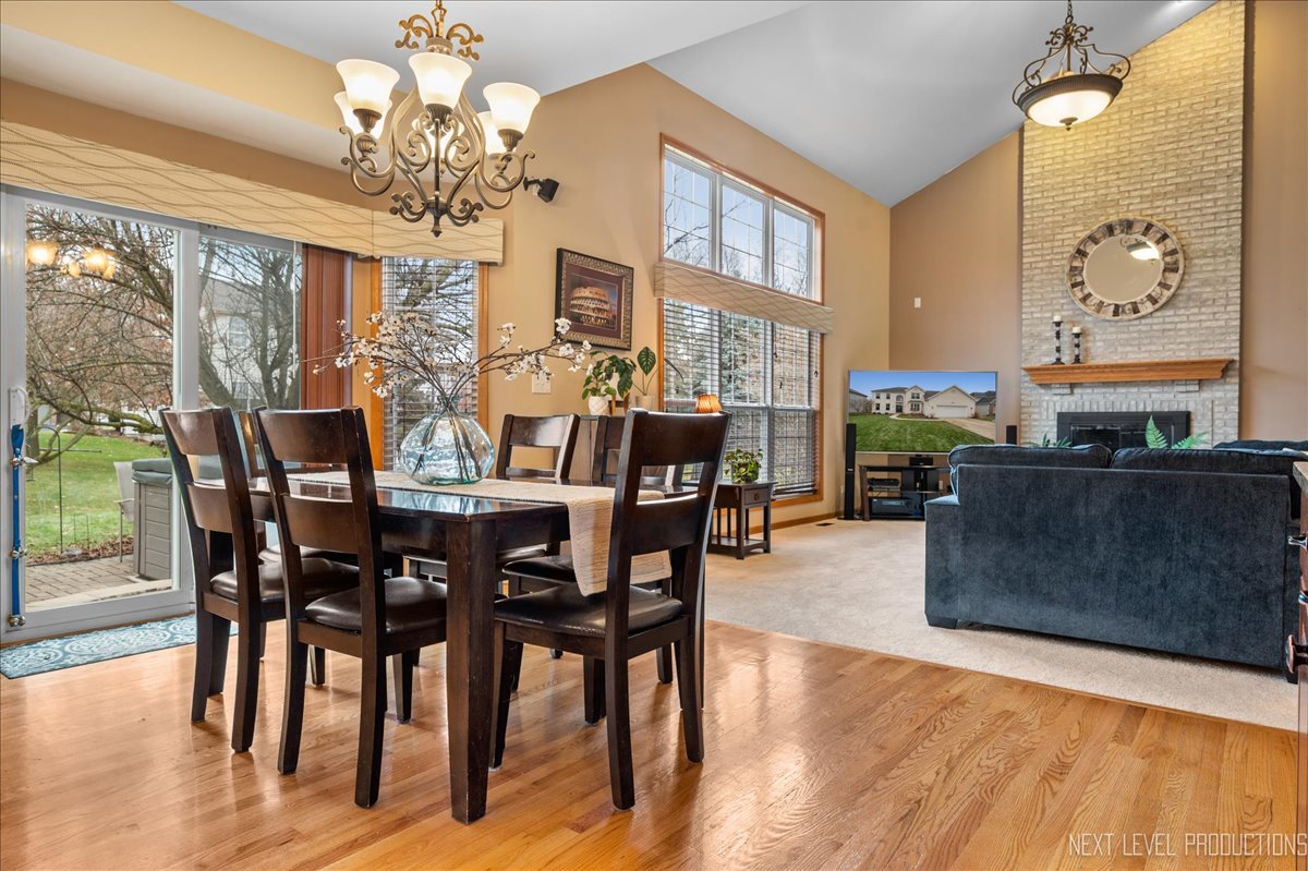 2620 Sweetbroom Road Naperville, IL 60564 - Photo 5 of 30 a view of a dining room with furniture window and outside view