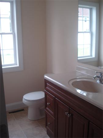 311 Arnold Springfield, MA 01119 - Photo 7 of 22 a bathroom with a sink toilet and window