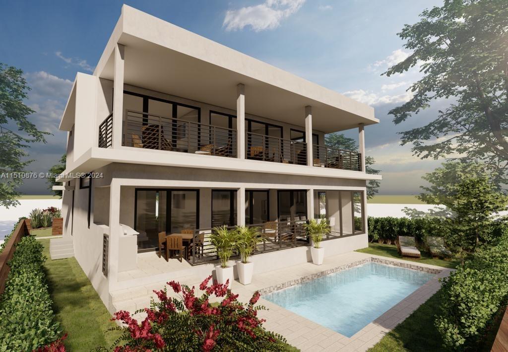 4625 Alton Road Miami Beach, FL 33140 - Photo 3 of 10 front view of a house with a patio