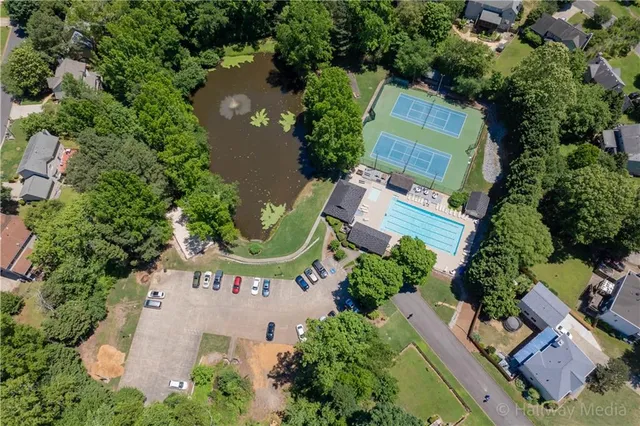 an aerial view of a house with a garden