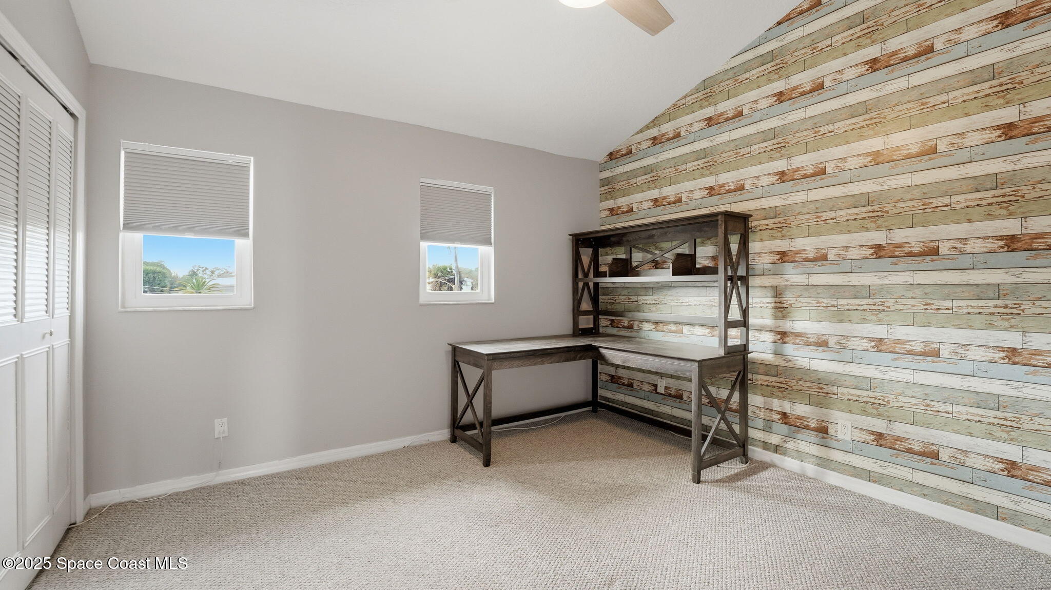 5087 Riveredge Drive, Unit 2 Titusville, FL 32780 - Photo 22 of 62 a room with storage and utility