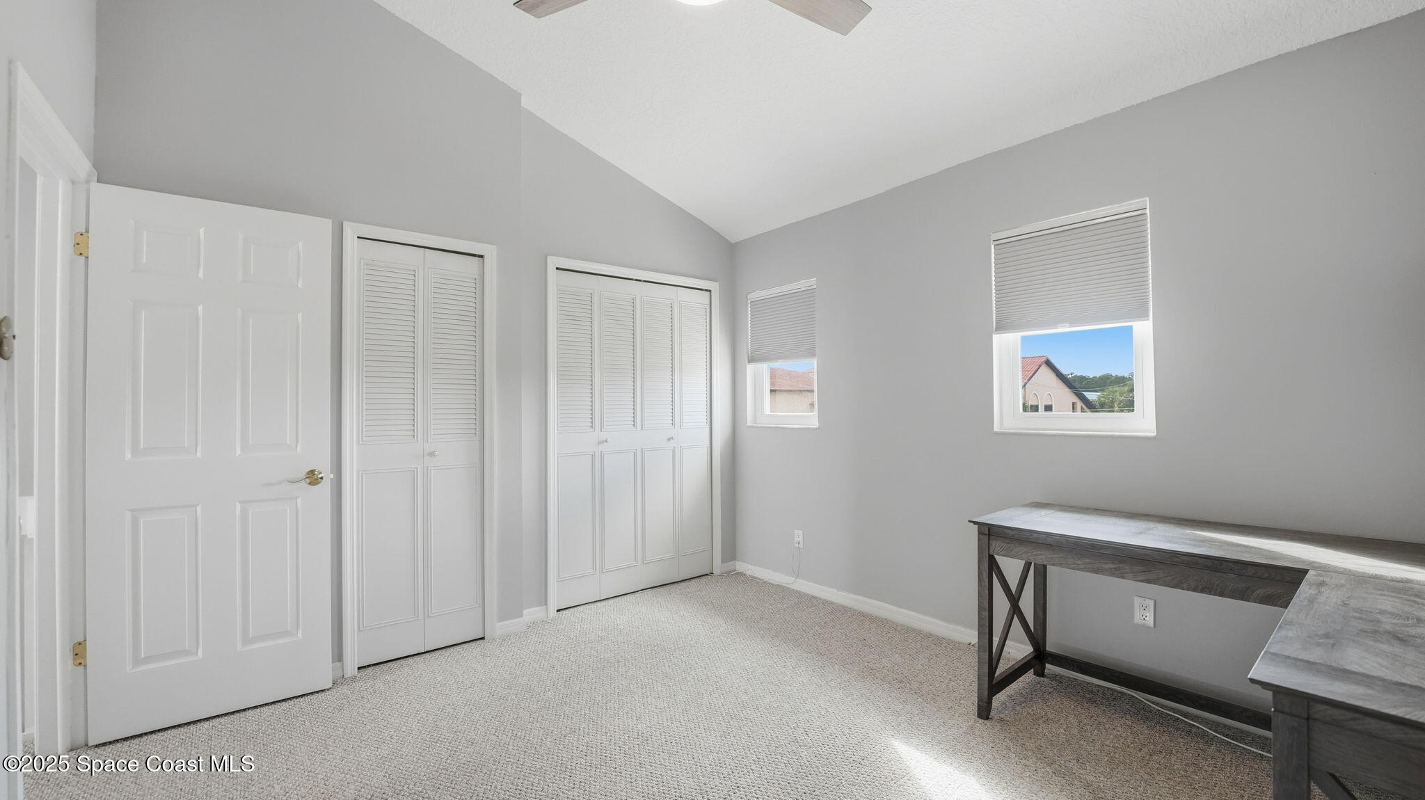 5087 Riveredge Drive, Unit 2 Titusville, FL 32780 - Photo 23 of 62 a view of room with window and furniture