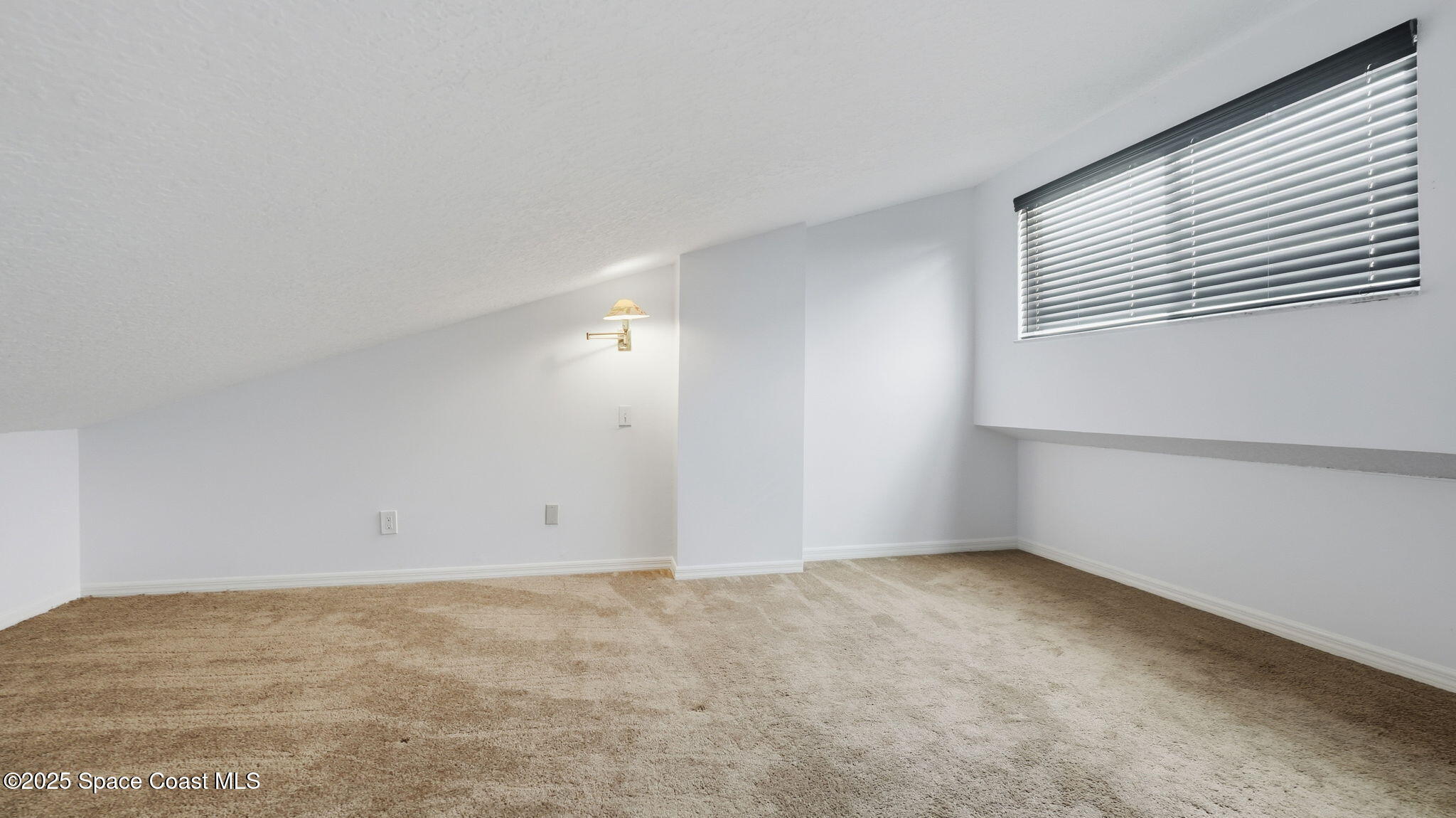 5087 Riveredge Drive, Unit 2 Titusville, FL 32780 - Photo 25 of 62 a view of an empty room