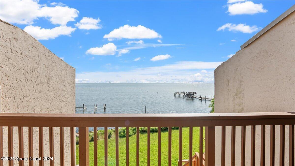 5087 Riveredge Drive, Unit 2 Titusville, FL 32780 - Photo 29 of 62 a view of a balcony with an outdoor space