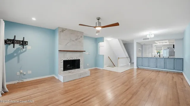 a view of a livingroom with a fireplace