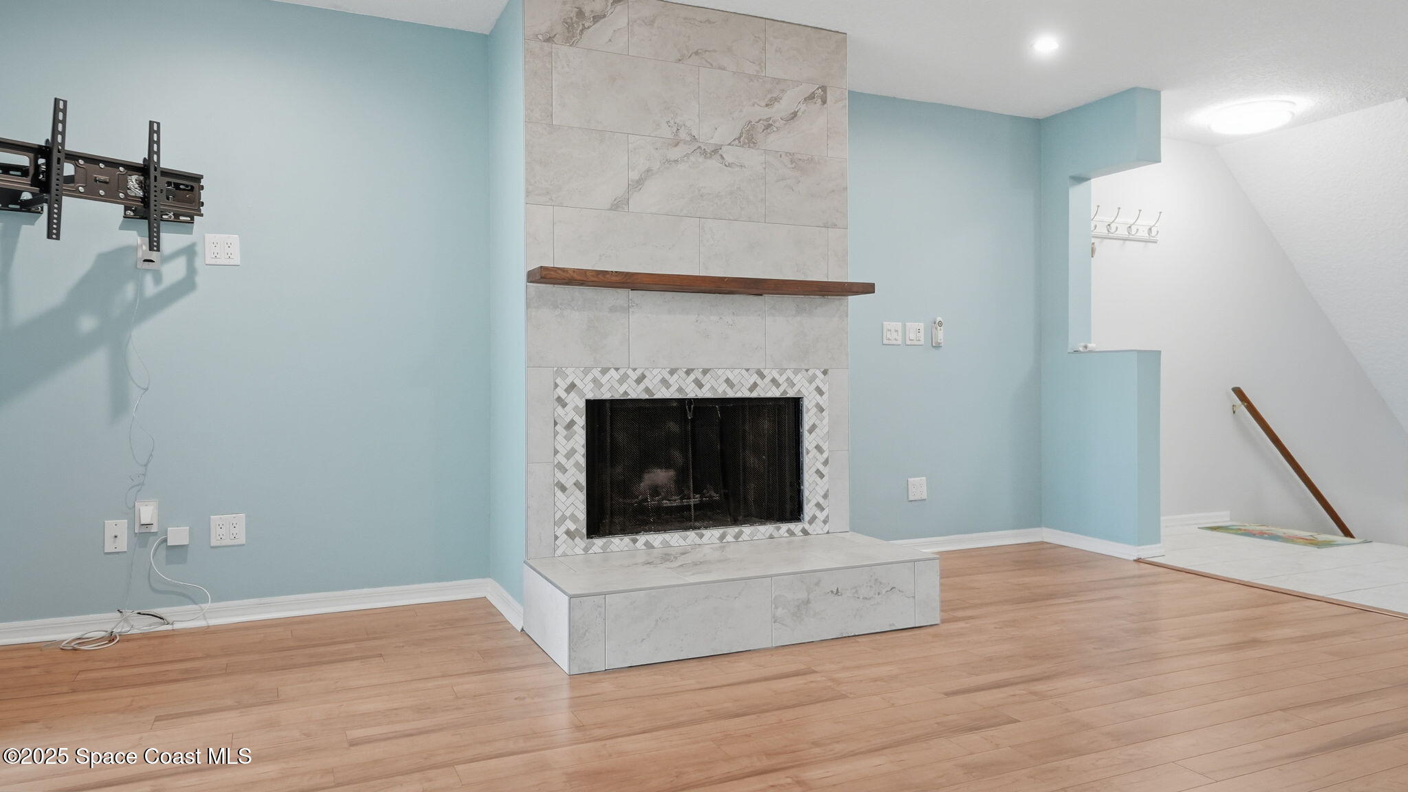 5087 Riveredge Drive, Unit 2 Titusville, FL 32780 - Photo 10 of 62 a view of a livingroom with a fireplace