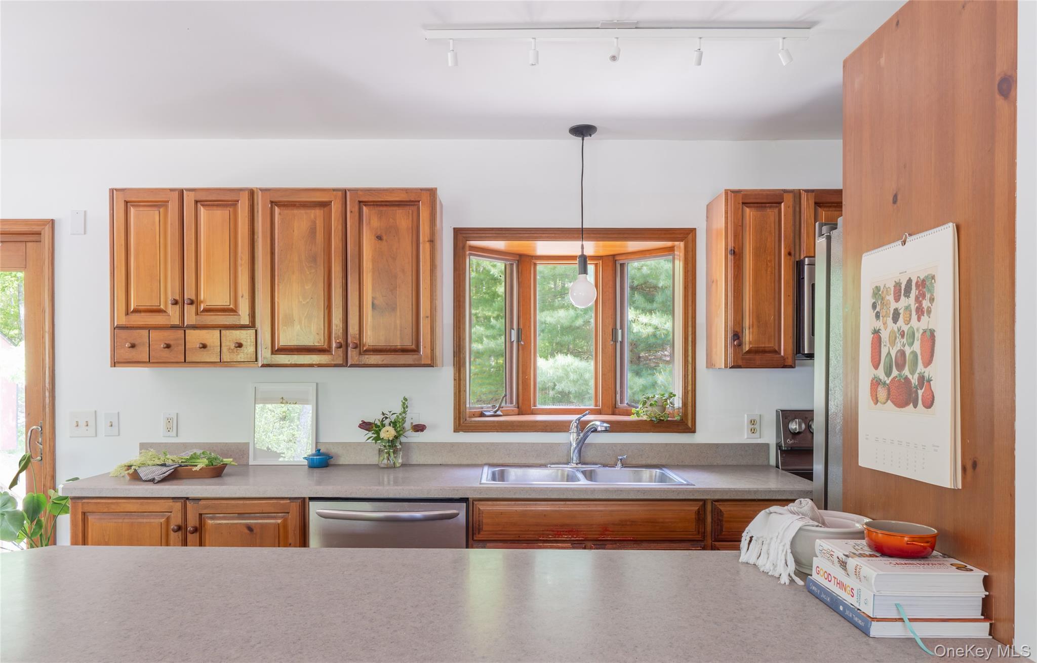 182 Frey Road Pine Bush, NY 12566 - Photo 8 of 33 a kitchen with large windows and refrigerator