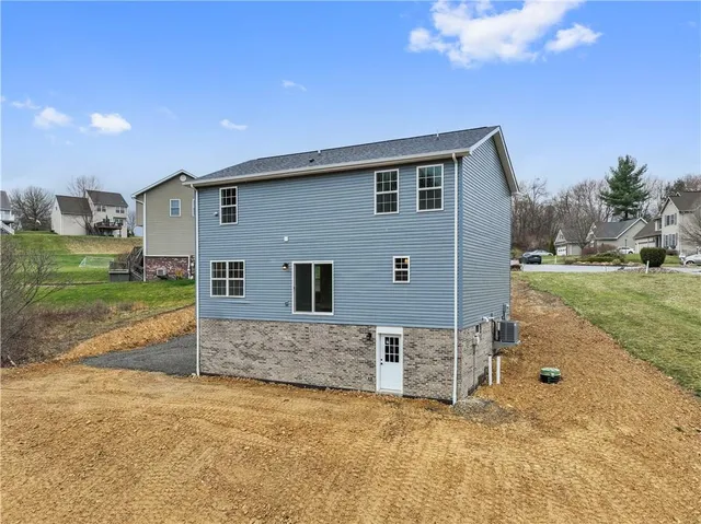 a house view with a backyard space