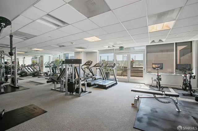 a outdoor patio with table and chairs