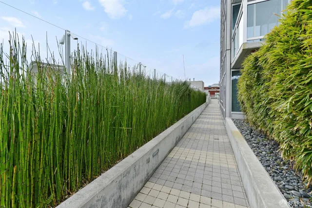 a view of a backyard with sitting area
