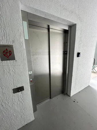 a bathroom with a bathtub a sink a toilet and a mirror