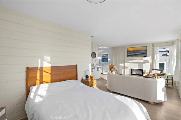 a bed room with a bed and furniture