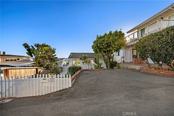 a view of a house with a street