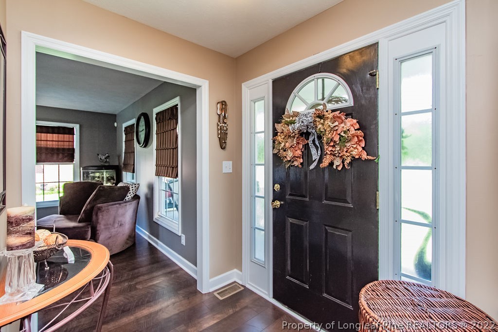 1105 John McMillan Road Hope Mills, NC 28348 - Photo 15 of 50 a view of living room and wooden floor