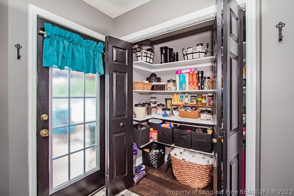 1105 John McMillan Road Hope Mills, NC 28348 - Photo 20 of 50 a room with a book shelf and a window