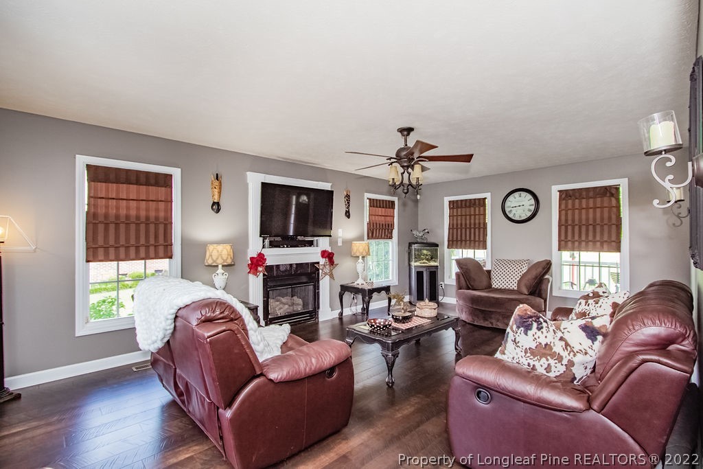 1105 John McMillan Road Hope Mills, NC 28348 - Photo 21 of 50 a living room with furniture and a flat screen tv