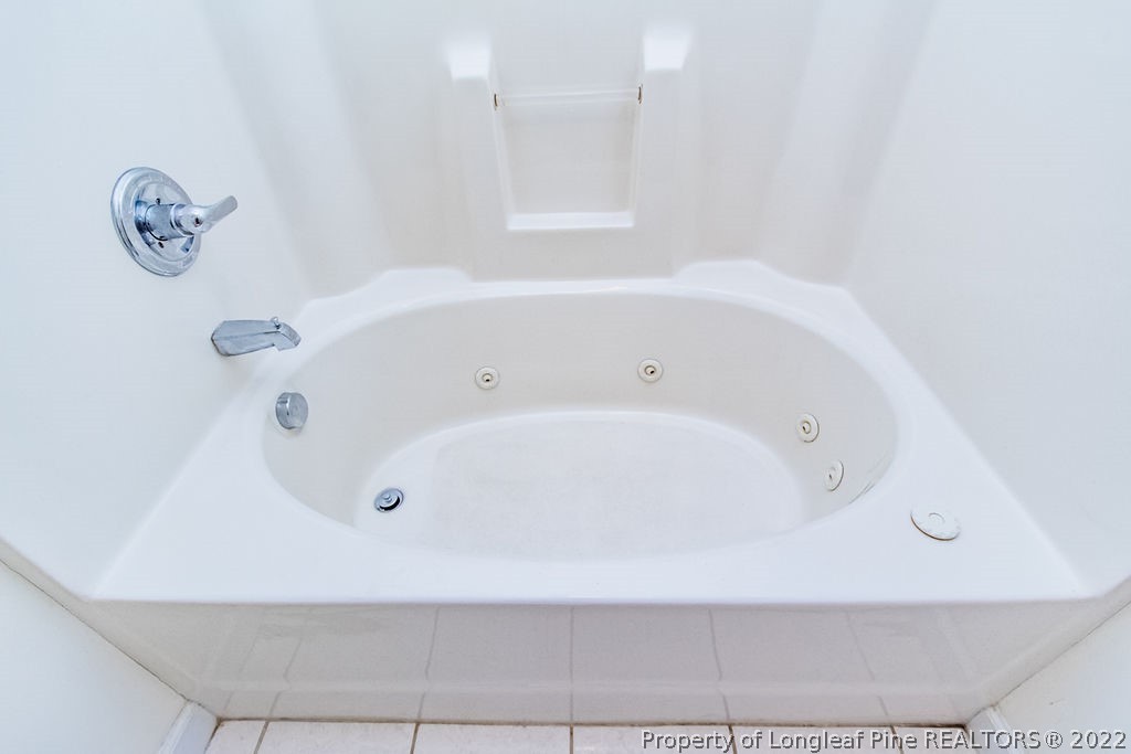 1105 John McMillan Road Hope Mills, NC 28348 - Photo 33 of 50 a bathroom with a bathtub