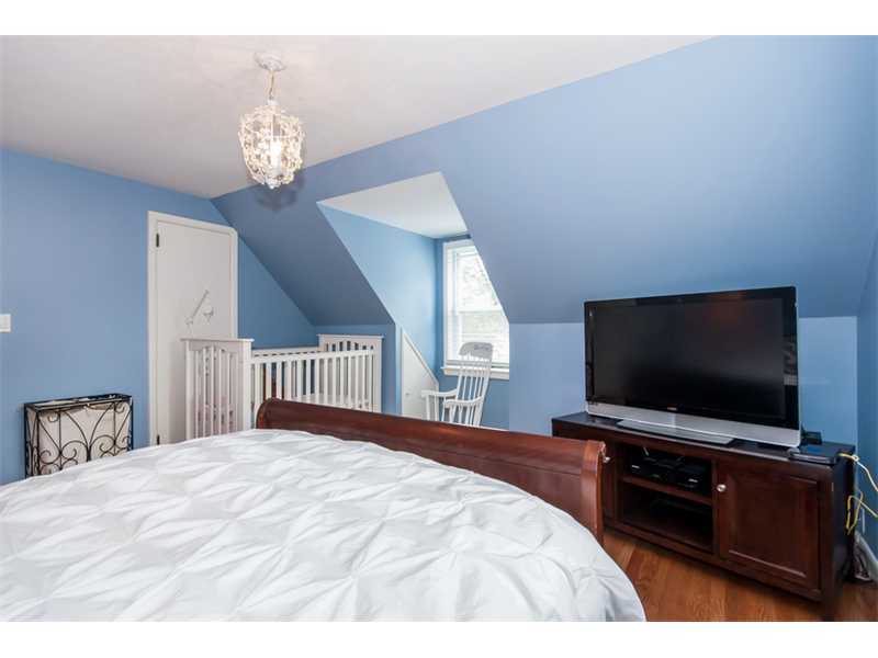 3 Green Lane Greenwich, CT 06831 - Photo 11 of 20 a bedroom with a bed and a flat screen tv
