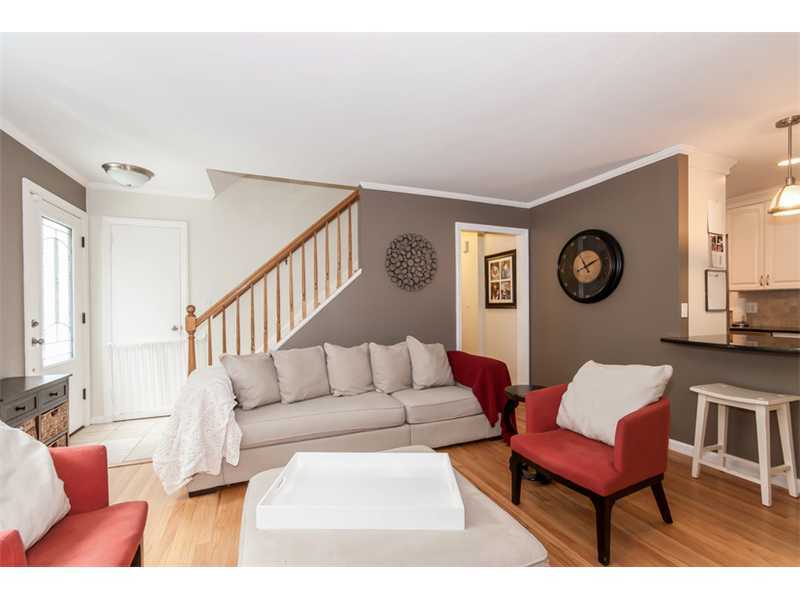 3 Green Lane Greenwich, CT 06831 - Photo 3 of 20 a living room with furniture a rug and a wall painting